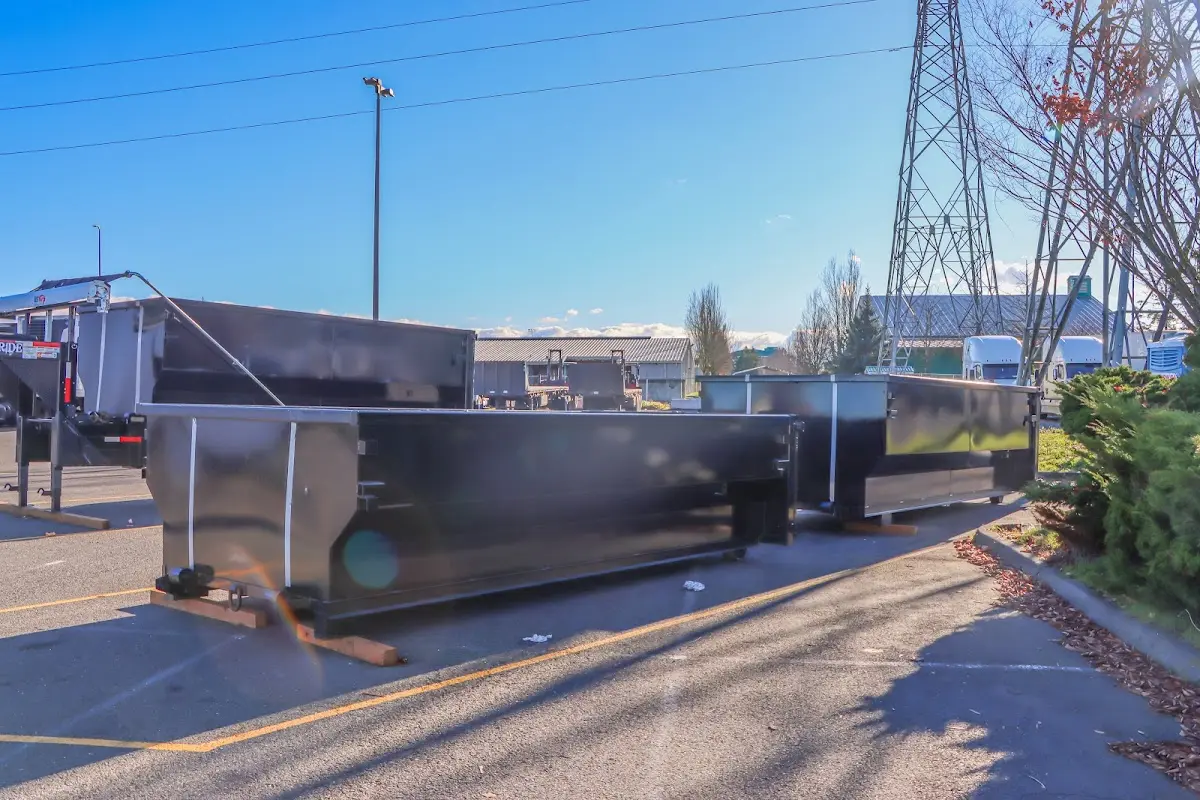 Roll-off dumpster ready for waste disposal at job site for Yard Waste Dumpster Rental in Massapequa Park